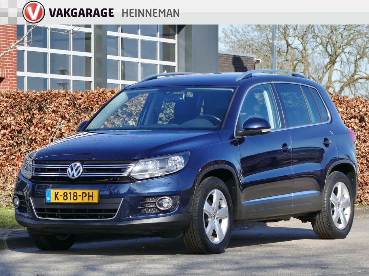 Volkswagen Tiguan - 1.4 TSI Sport&Style | stoelverwarming | navigatie | bluetooth - AutoWereld.nl