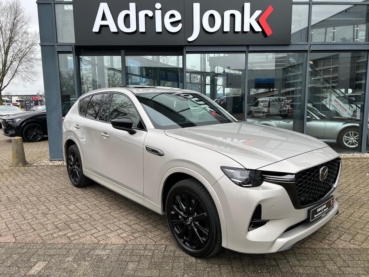 Mazda CX-60 - 2.5 e-SkyActiv PHEV Homura Plus AUTOMAAT | PLUG-IN HYBRID | MEEST LUXE UITVOERING | PANORA - AutoWereld.nl