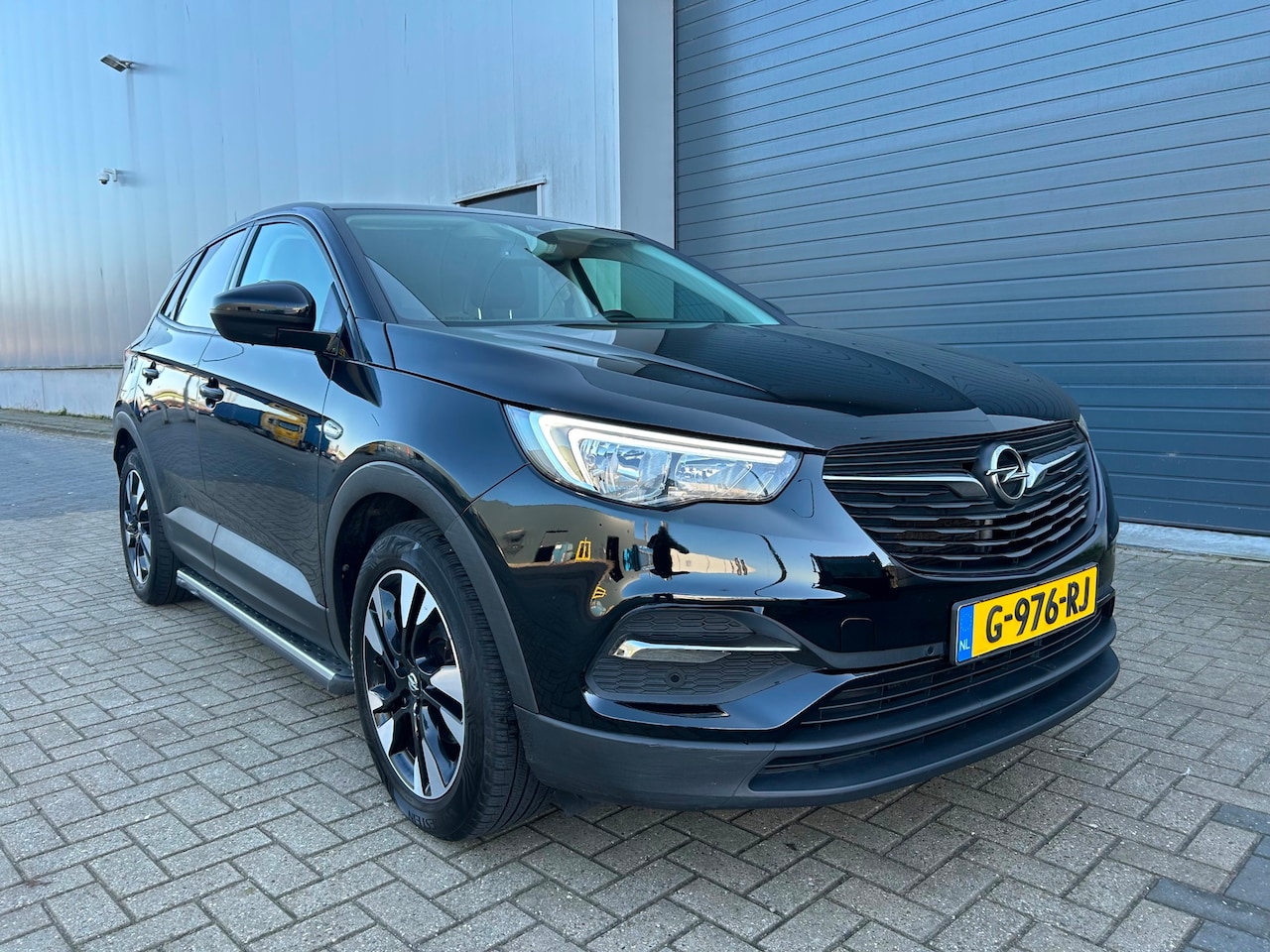Opel Grandland X - 1.2i Turbo 120 Edition NAVI LEDER PDC - AutoWereld.nl