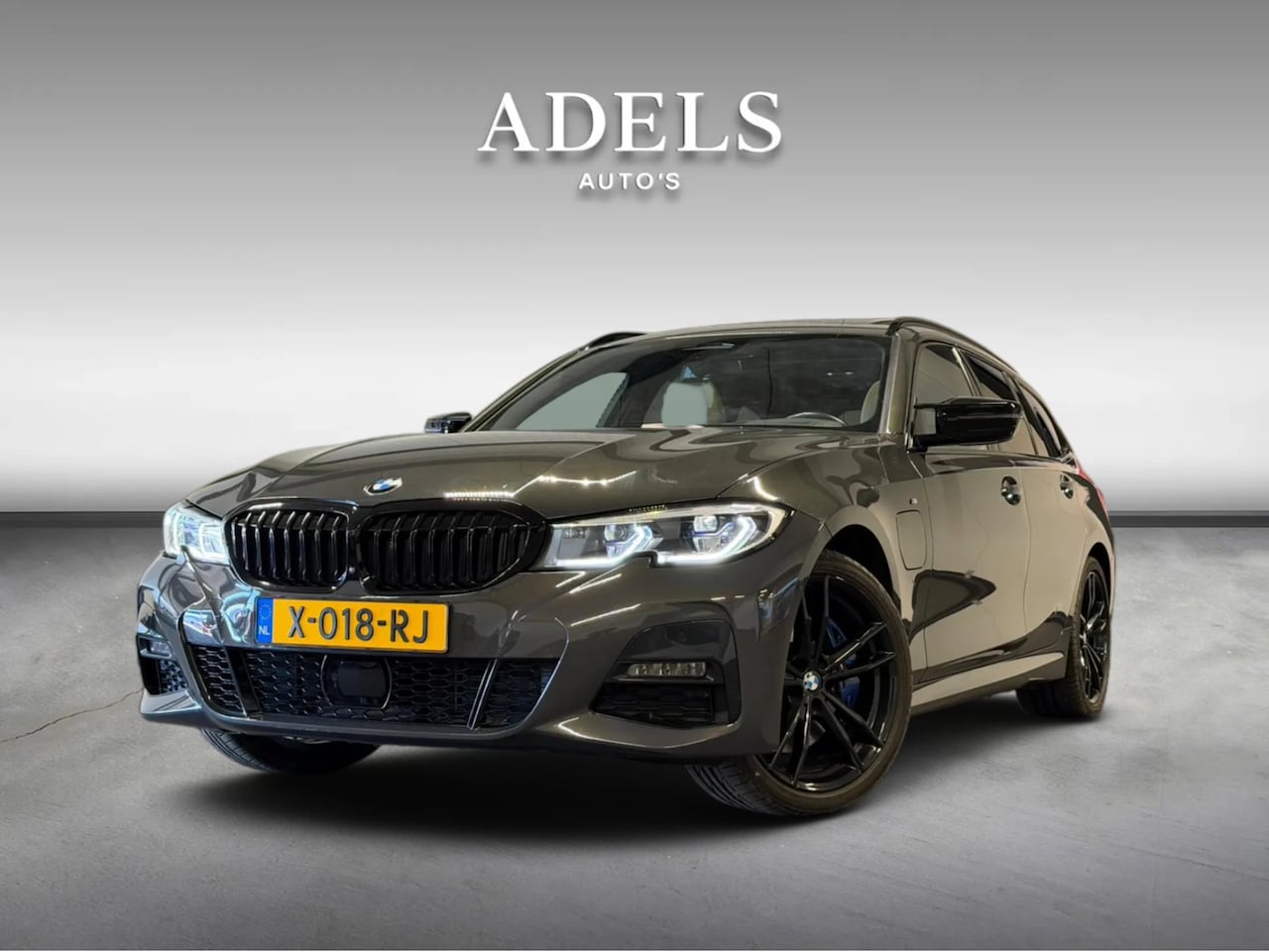 BMW 3-serie Touring - 330e xDrive High Executive M340i Diff Panodak Laserled Harman Kardon HUD ACC Dealer Onderh - AutoWereld.nl
