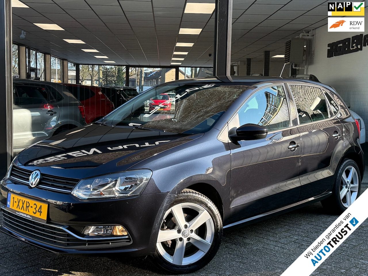 Volkswagen Polo - 1.2 TSI Highline AUTOMAAT | CLIMA | CRUISE | LMV | NAP - AutoWereld.nl