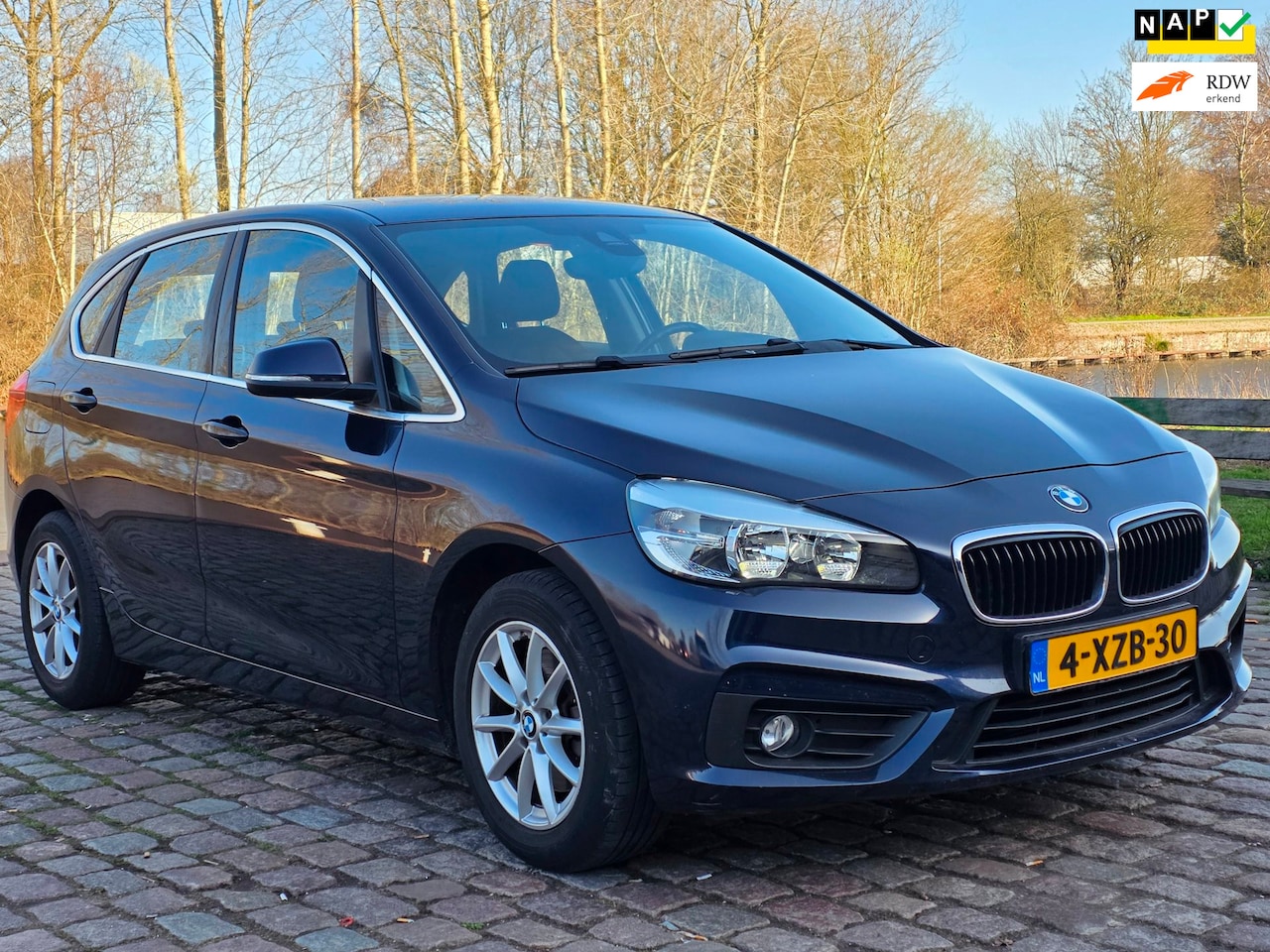 BMW 2-serie Active Tourer - 218i Executive 1e eigenaar airco elektrische ramen cv op afs - AutoWereld.nl