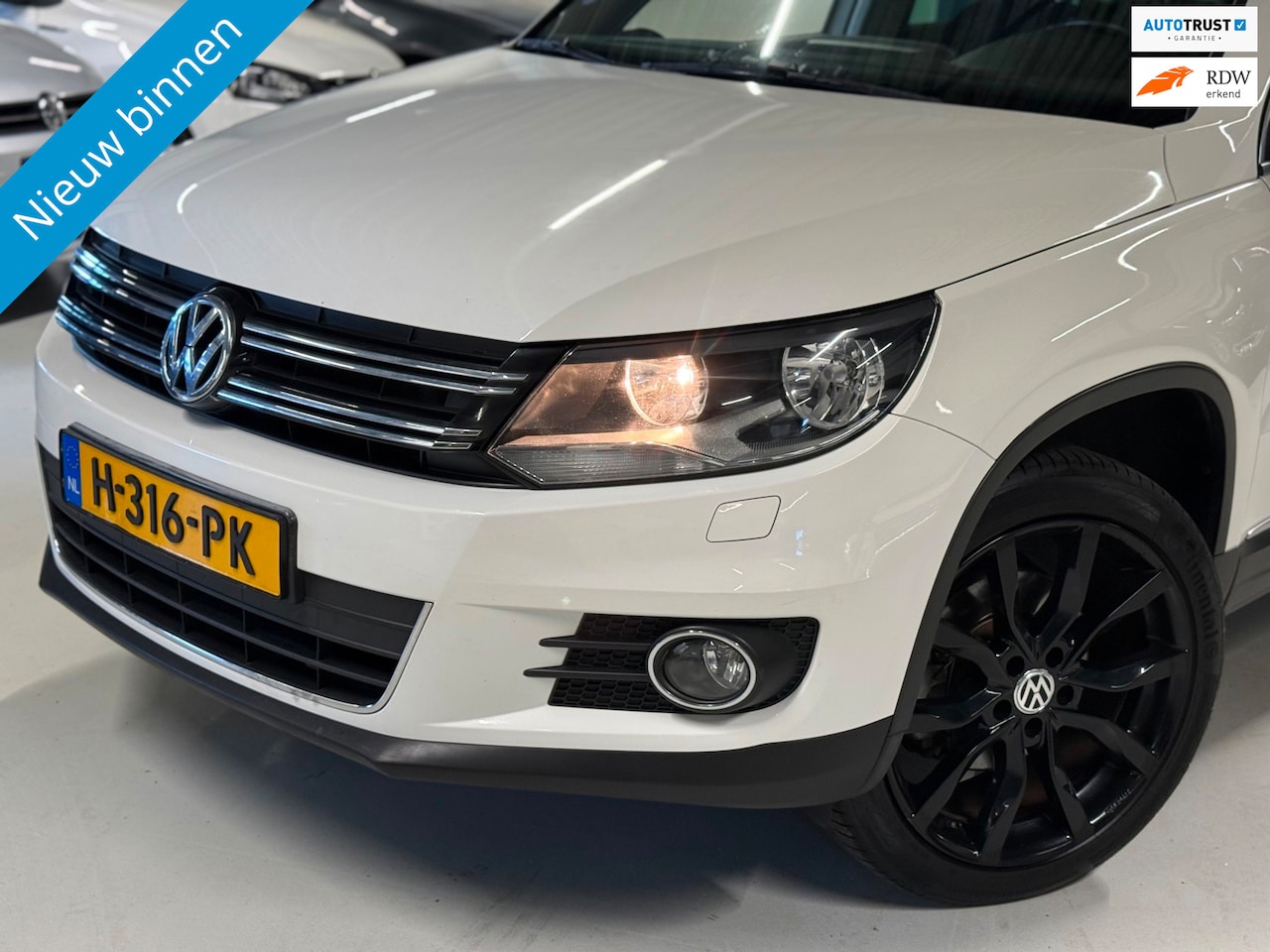Volkswagen Tiguan - 1.4 TSI 150PK Sport&Style Carplay|Trekhaak! - AutoWereld.nl