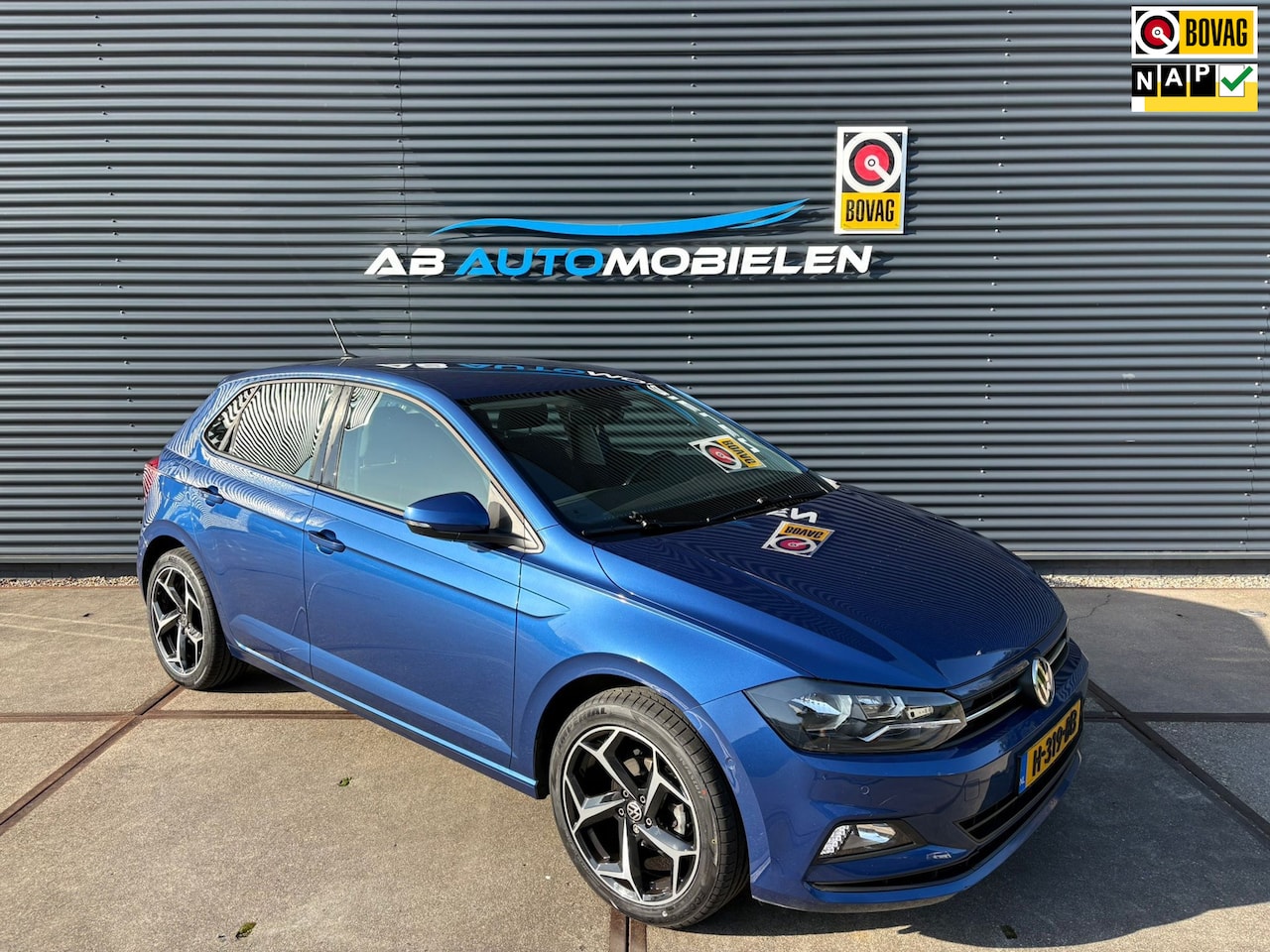 Volkswagen Polo - 1.0 TSI Comfortline Business DIGITAL DASH/ PARK ASSIST/ CARPLAY/ NAVI - AutoWereld.nl