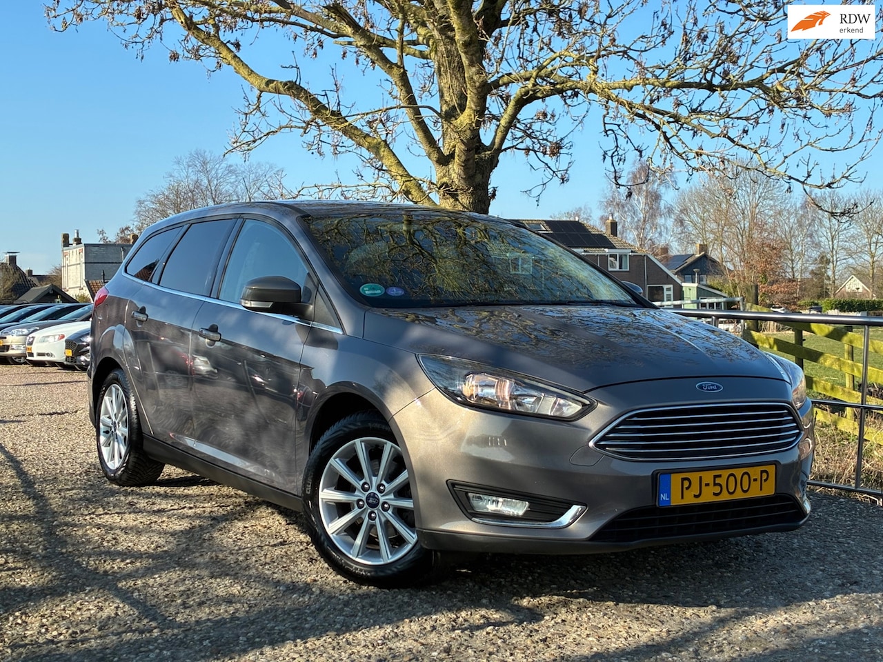 Ford Focus Wagon - 1.0 Titanium | Cruise + Clima + Navi nu € 5.975,-!!! - AutoWereld.nl