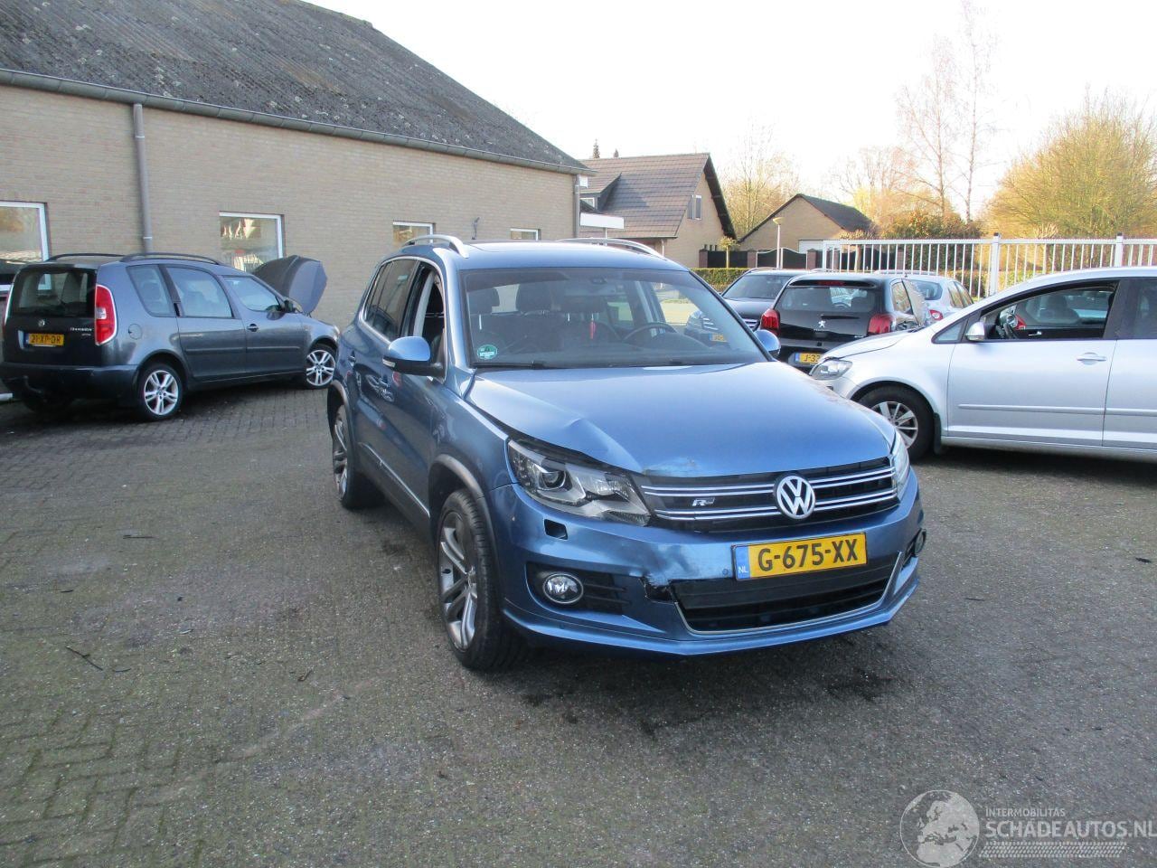 Volkswagen Tiguan - 2.0 TSI R-Line Sport&St.4M REST BPM €800,-!!! - AutoWereld.nl