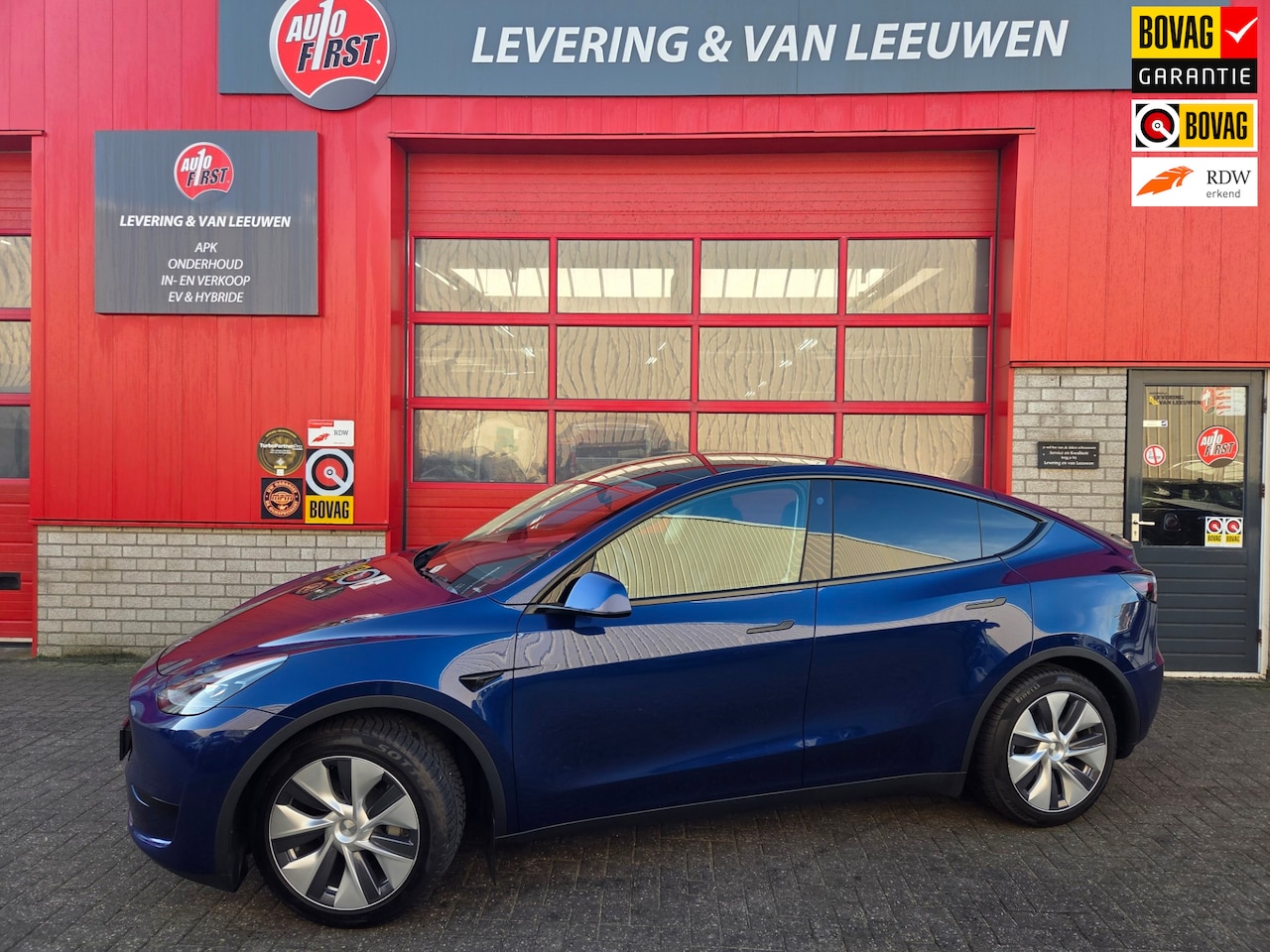 Tesla Model Y - RWD 58 kWh Panorama/ Navigatie/ Lederen bekleding/ Camera/ Rijklaarprijs! - AutoWereld.nl