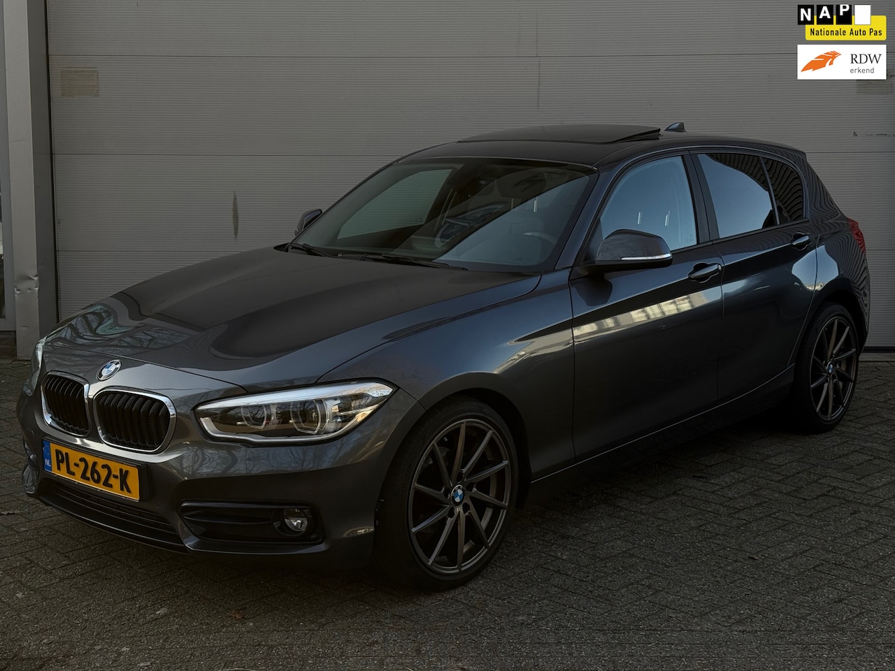 BMW 1-serie - 118i Corporate Lease High Executive l Schuifdak l Leder l Navi Prof l Xenon l Winterset l - AutoWereld.nl