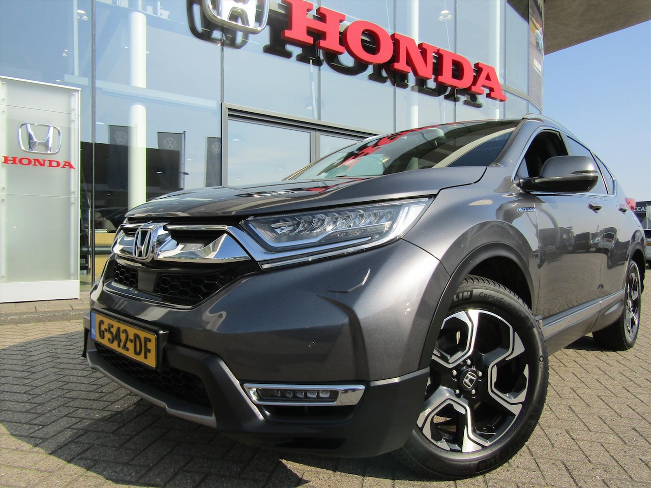 Honda CR-V - 2.0 HYBRID 184pk AWD E-CVT Executive,Trekhaak - AutoWereld.nl