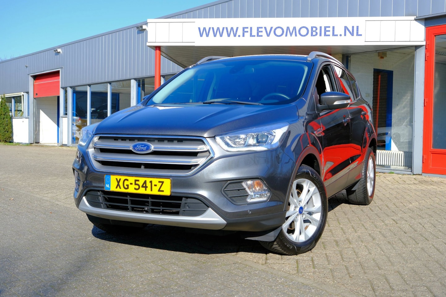 Ford Kuga - 1.5 150PK EcoBoost Titanium Navi|Half Leder|ParkAssist|LMV|Trekhaak - AutoWereld.nl