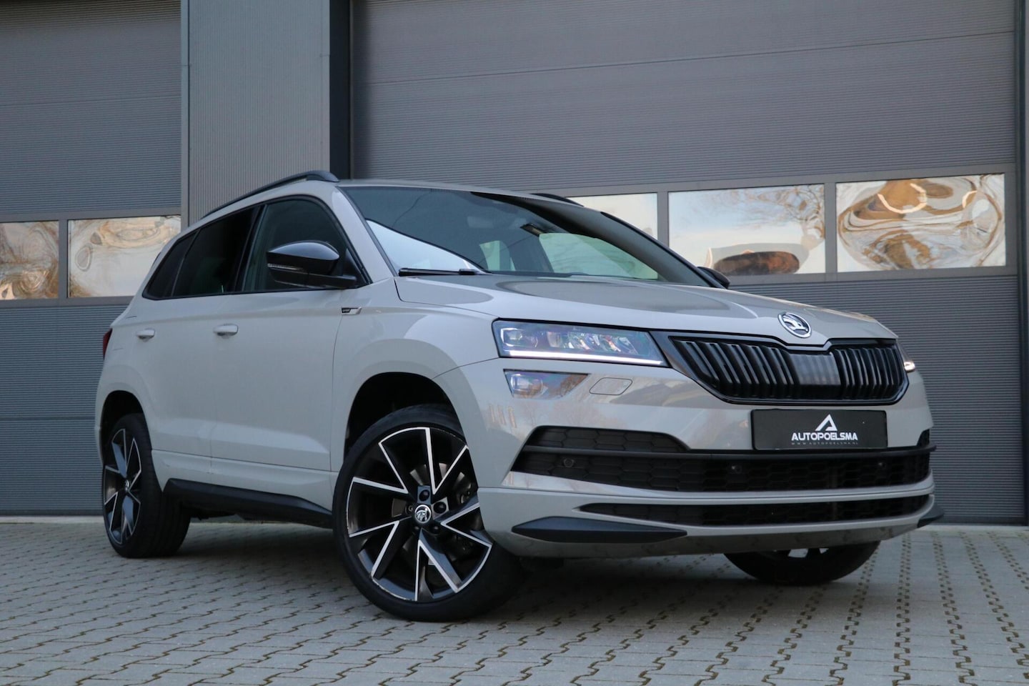 Skoda Karoq - 1.5 TSI ACT Sportline Business Canton Sound System Schuif-Kanteldak Lmv Sportzetels AppleC - AutoWereld.nl