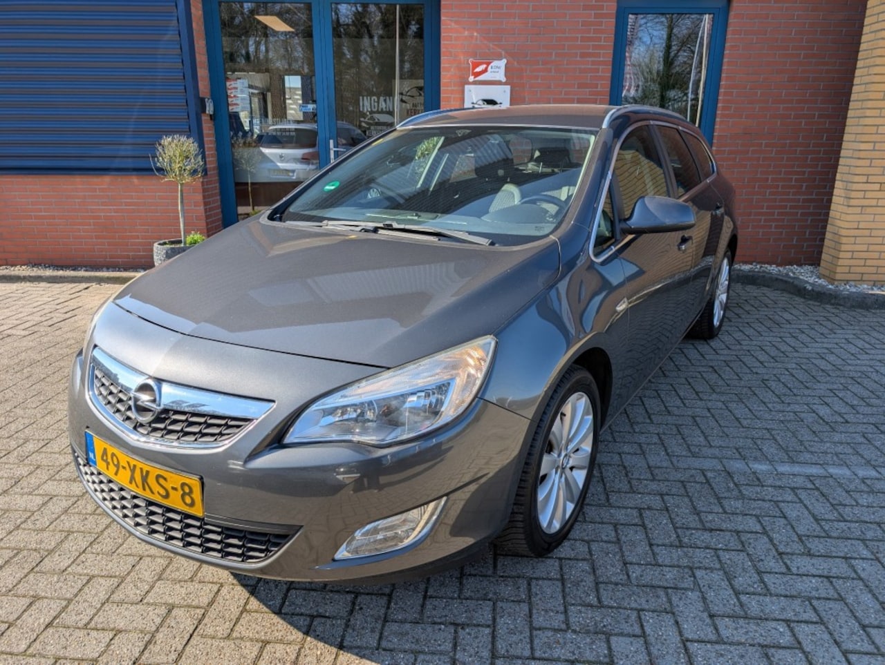 Opel Astra - 1.4 Turbo Cosmo 1.4 TURBO COSMO, trekhaak, navi, cruise, airco - AutoWereld.nl