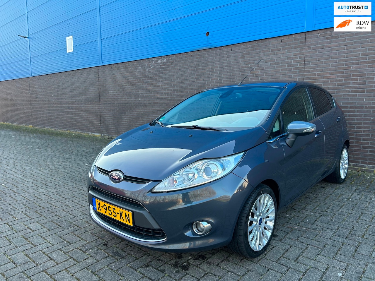 Ford Fiesta - 1.4 Titanium | Trekhaak | Parkeersensoren | Climate | Cruise | 16” LM Velgen | Stoelverwar - AutoWereld.nl