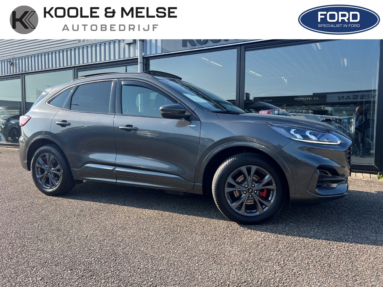 Ford Kuga - 2.5 PHEV e-CVT 225pk ST-Line X , trekhaak , panodak , voorruitverwarming , stoel , achterb - AutoWereld.nl