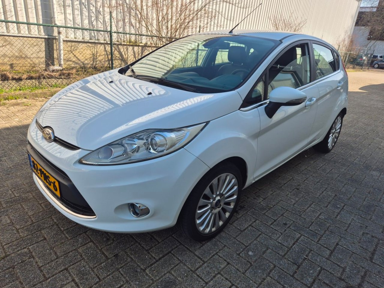 Ford Fiesta - 1.25 Titanium 1.25 Titanium,5drs,Clima,leder,128000km Nap!! - AutoWereld.nl
