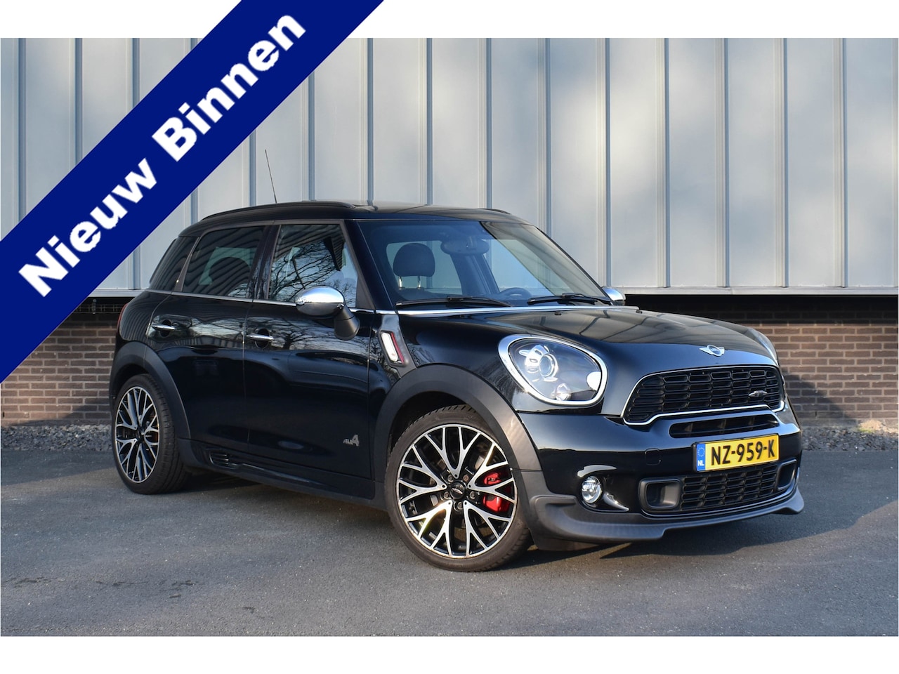 MINI Countryman - Mini 1.6 John Cooper Works ALL4 Chili | Pano | Vol. Onderhouden | Navi - AutoWereld.nl