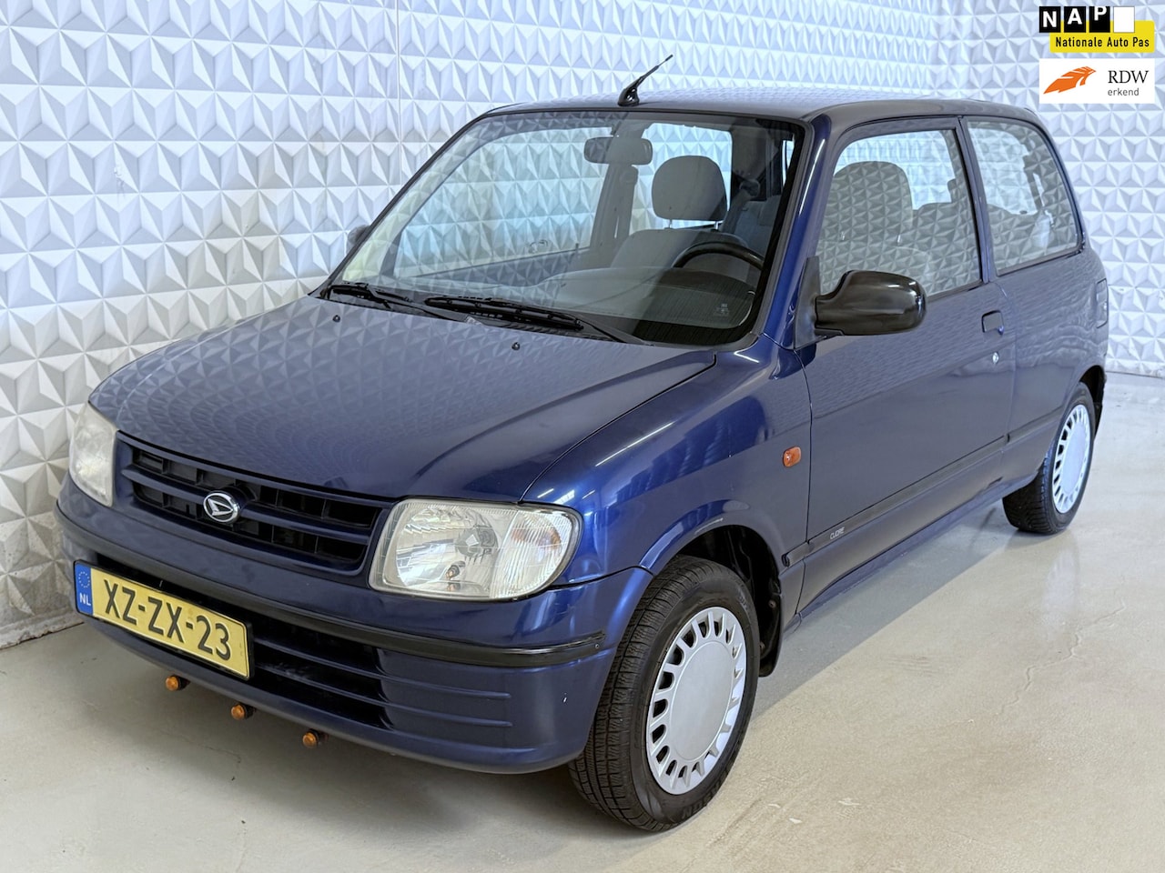 Daihatsu Cuore - 1.0-12V XTi TREKHAAK / 130.000km (1999) - AutoWereld.nl