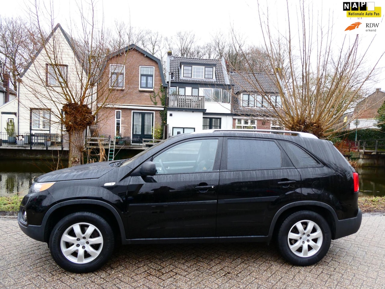 Kia Sorento - 2.4 X-tra 174pk Airco PDC Navi Trekhaak 2.000kg. 167.000km - AutoWereld.nl