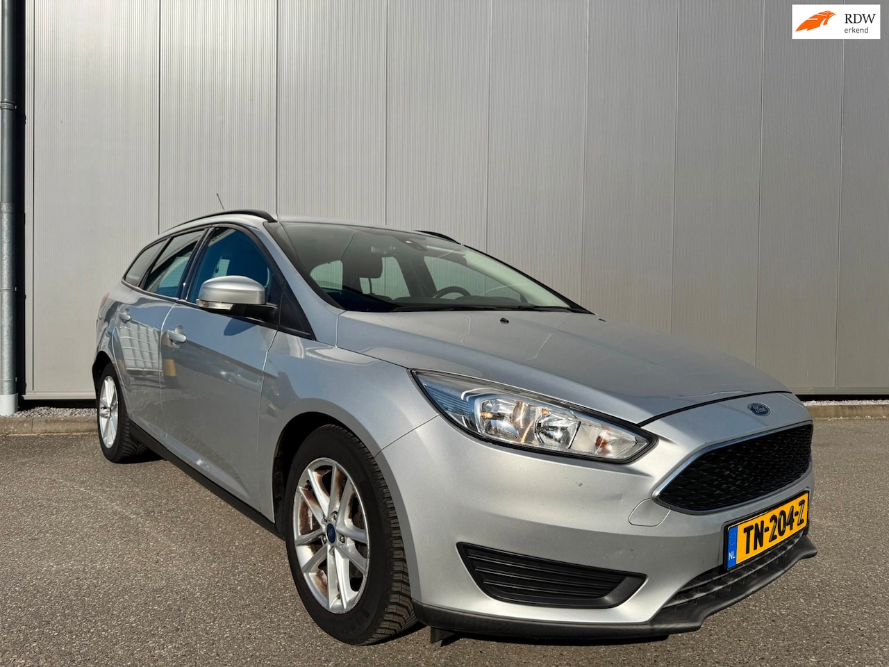 Ford Focus Wagon - 1.5 TDCI Edition airco navi lm - AutoWereld.nl