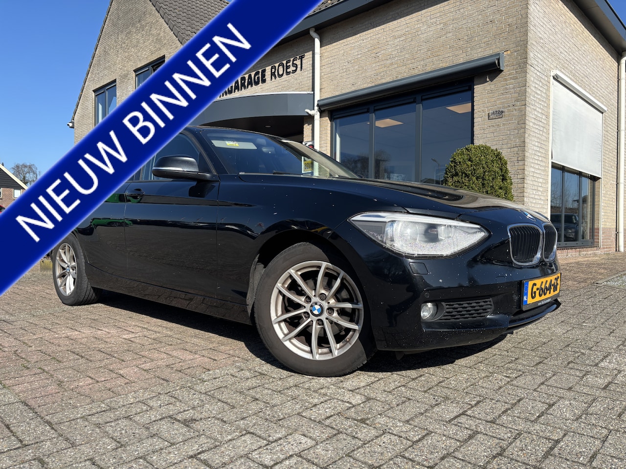 BMW 1-serie - 116i High Executive Automaat Leder / Navigatie / Parkeersensors - AutoWereld.nl