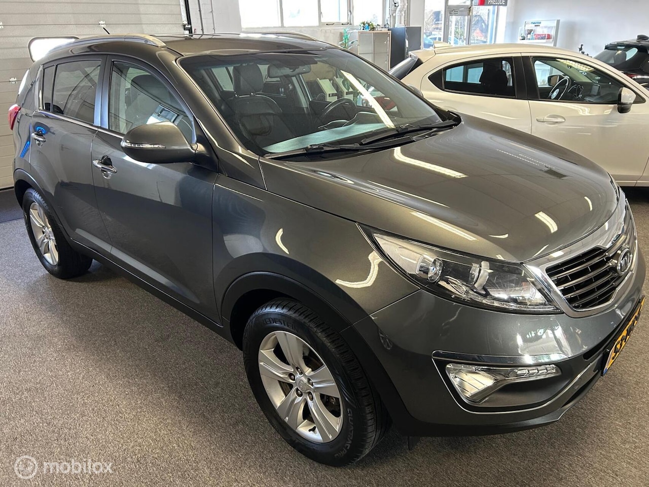 Kia Sportage - 1.6 GDI ISG X-ecutive Plus Pack 1.6 GDI ISG X-ecutive Plus Pack - AutoWereld.nl