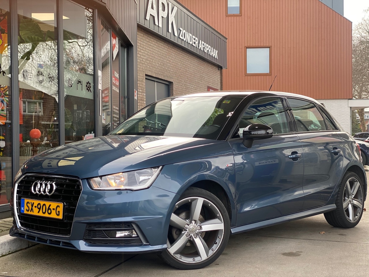 Audi A1 Sportback - 1.0 TFSI Adrenalin Navi | Airco | Cruise control - AutoWereld.nl