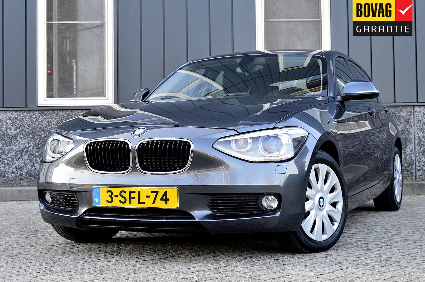 BMW 1-serie - 118i Executive Rijklaarprijs-Garantie Xenon Navigatie Airco 1e Eigenaar - AutoWereld.nl