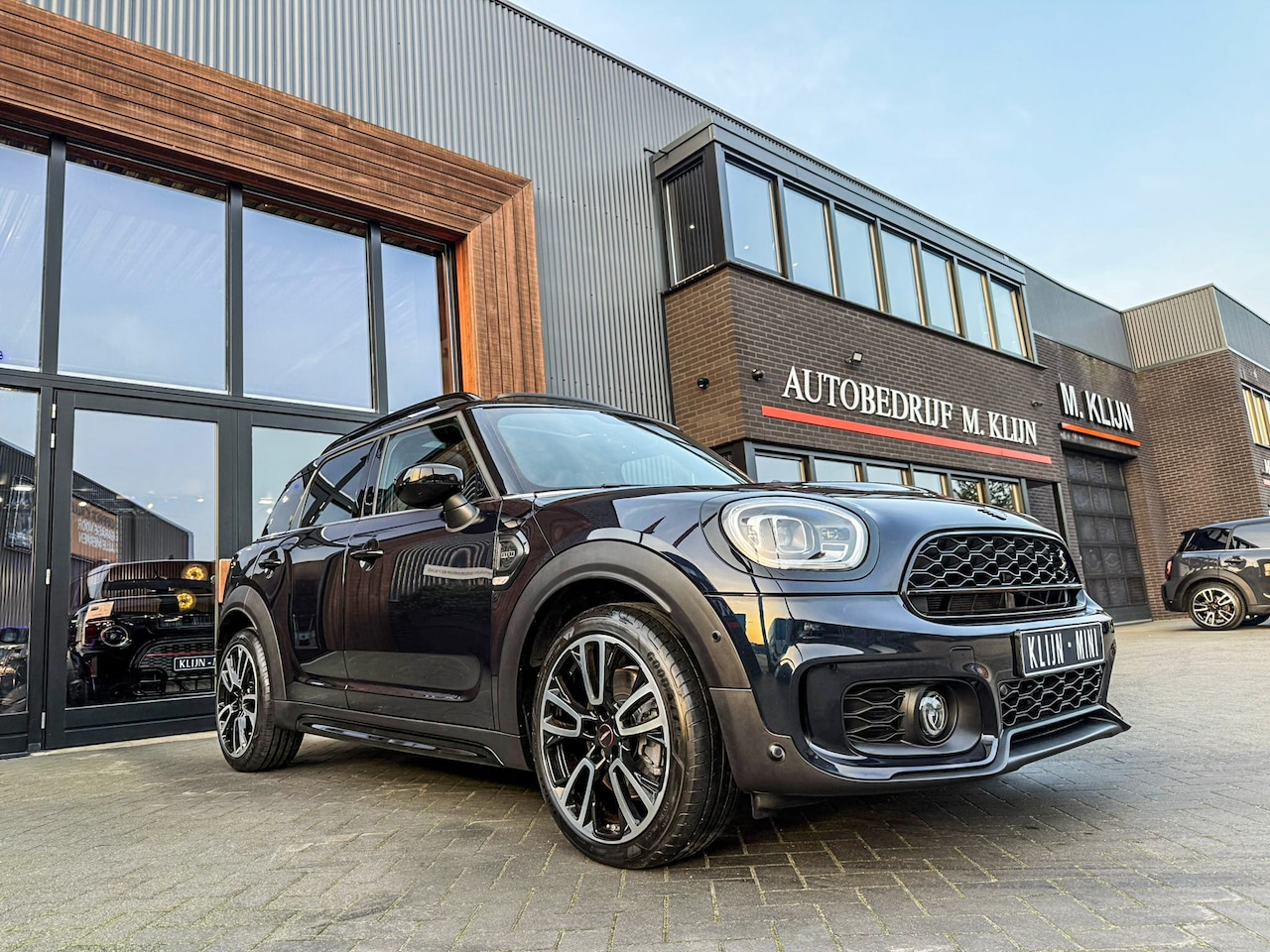 MINI Countryman - Mini 2.0 Cooper S ALL4 John Cooper Works F1 aut/Pano/Camera/Memory/Bomvol - AutoWereld.nl