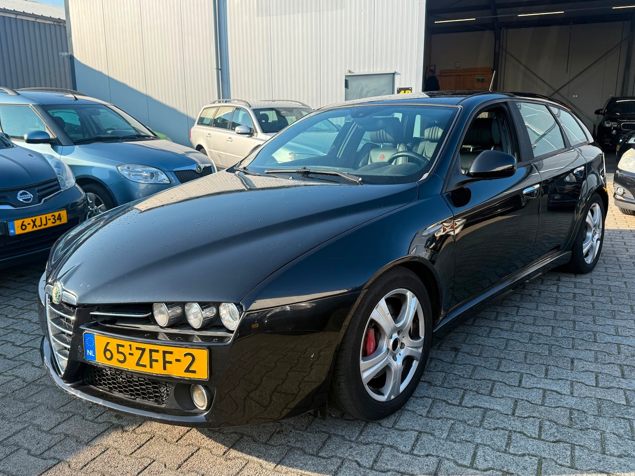 Alfa Romeo 159 Sportwagon - 2.2 JTS Selespeed TI 2010 Zwart Xenon - AutoWereld.nl