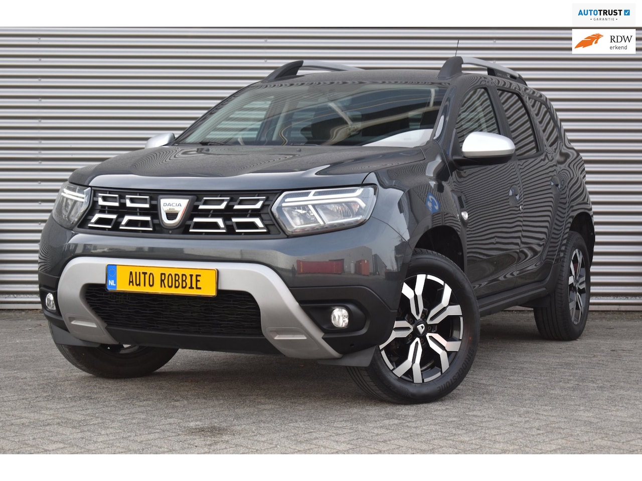 Dacia Duster - 1.3 TCe Prestige 1.3 TCe Prestige, Airco, Ecc, Cruise, Navi, Camera, Trekhaak. - AutoWereld.nl