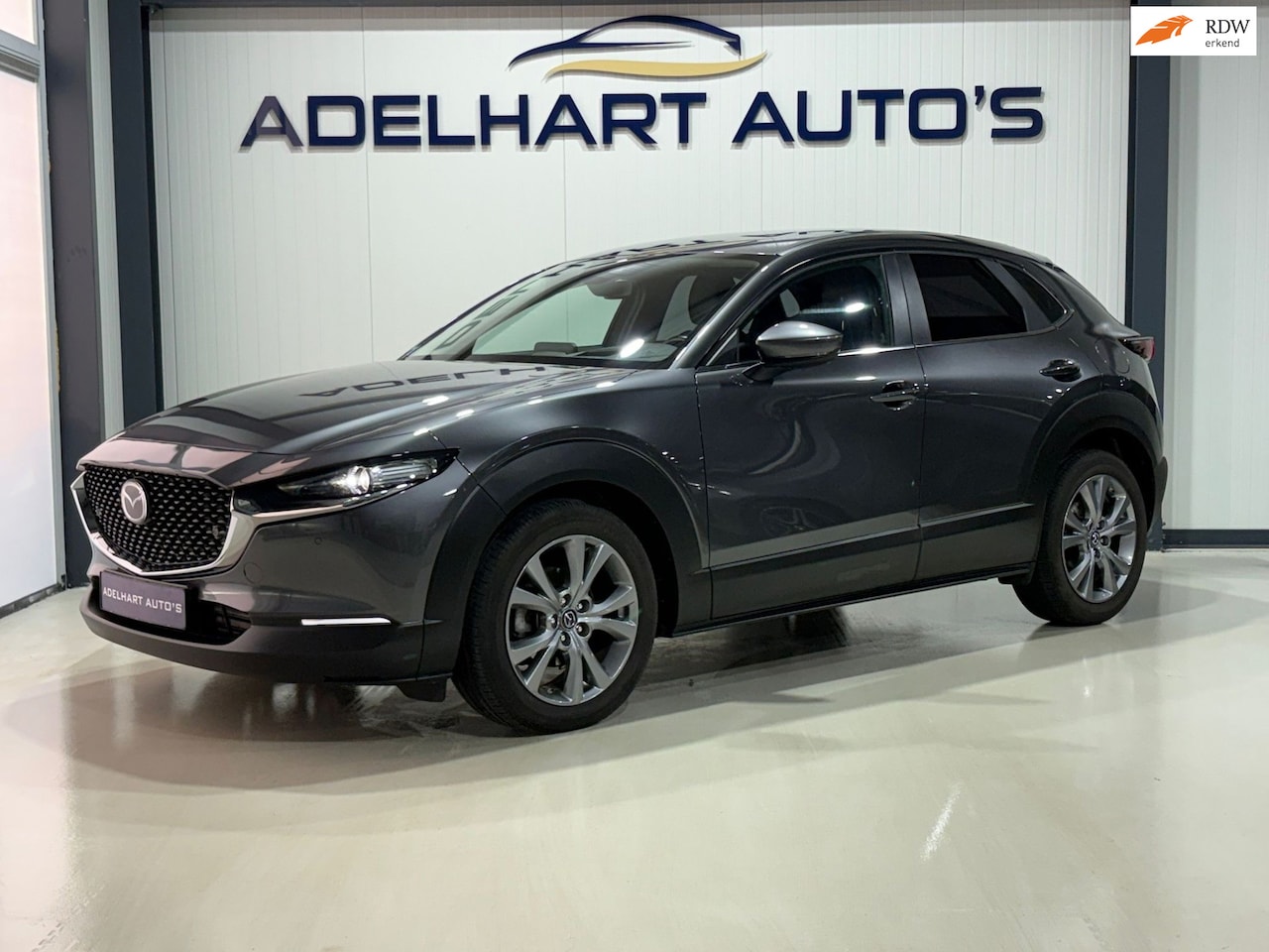 Mazda CX-30 - 2.0 e-SkyActiv-G M Hybrid Luxury Automaat / Lederen interieur / Navigatie full map / Full - AutoWereld.nl