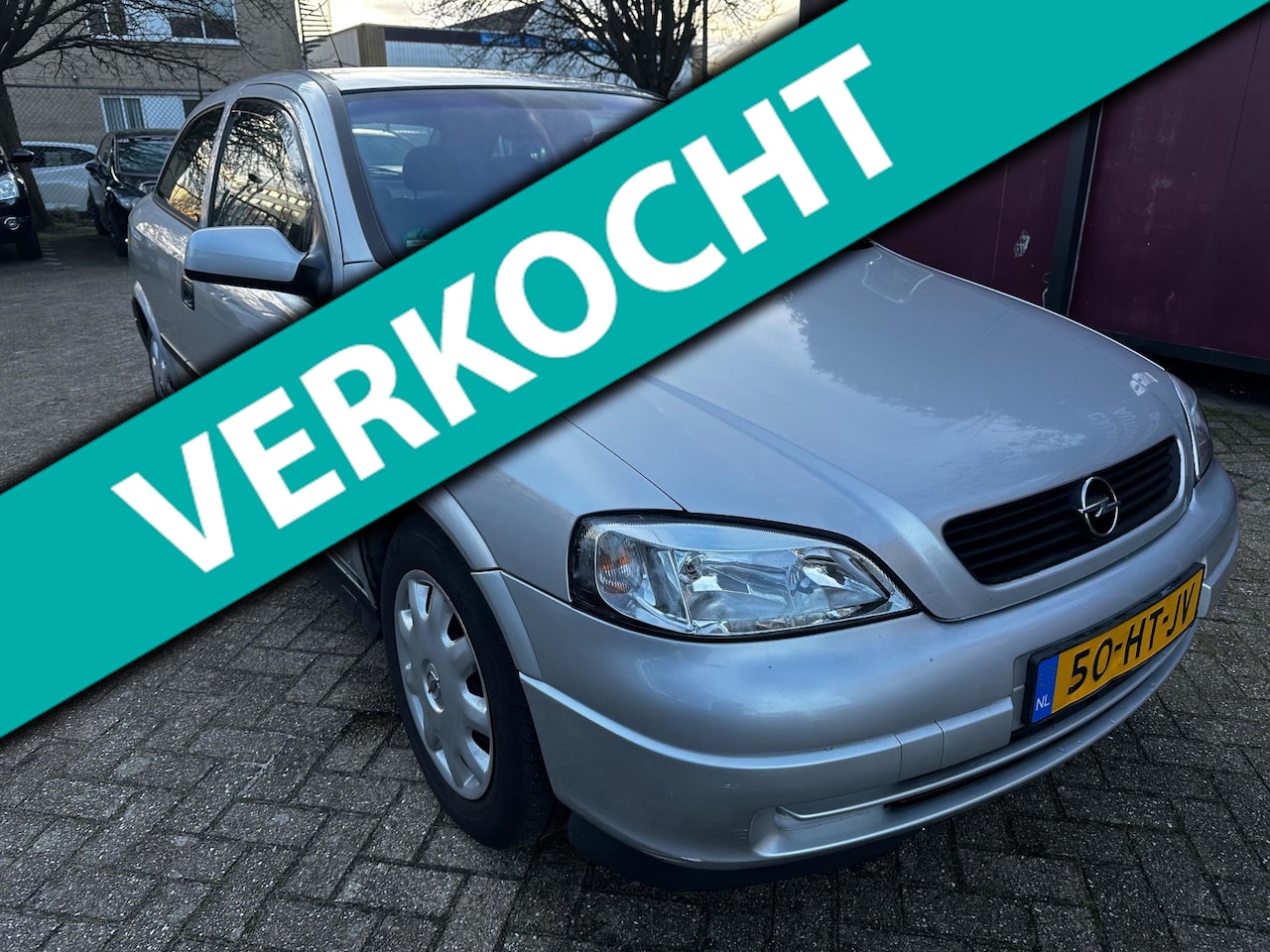 Opel Astra - 1.6 Comfort 1.6 Comfort,airco,nap,Parkeer sensor,trekhaak - AutoWereld.nl