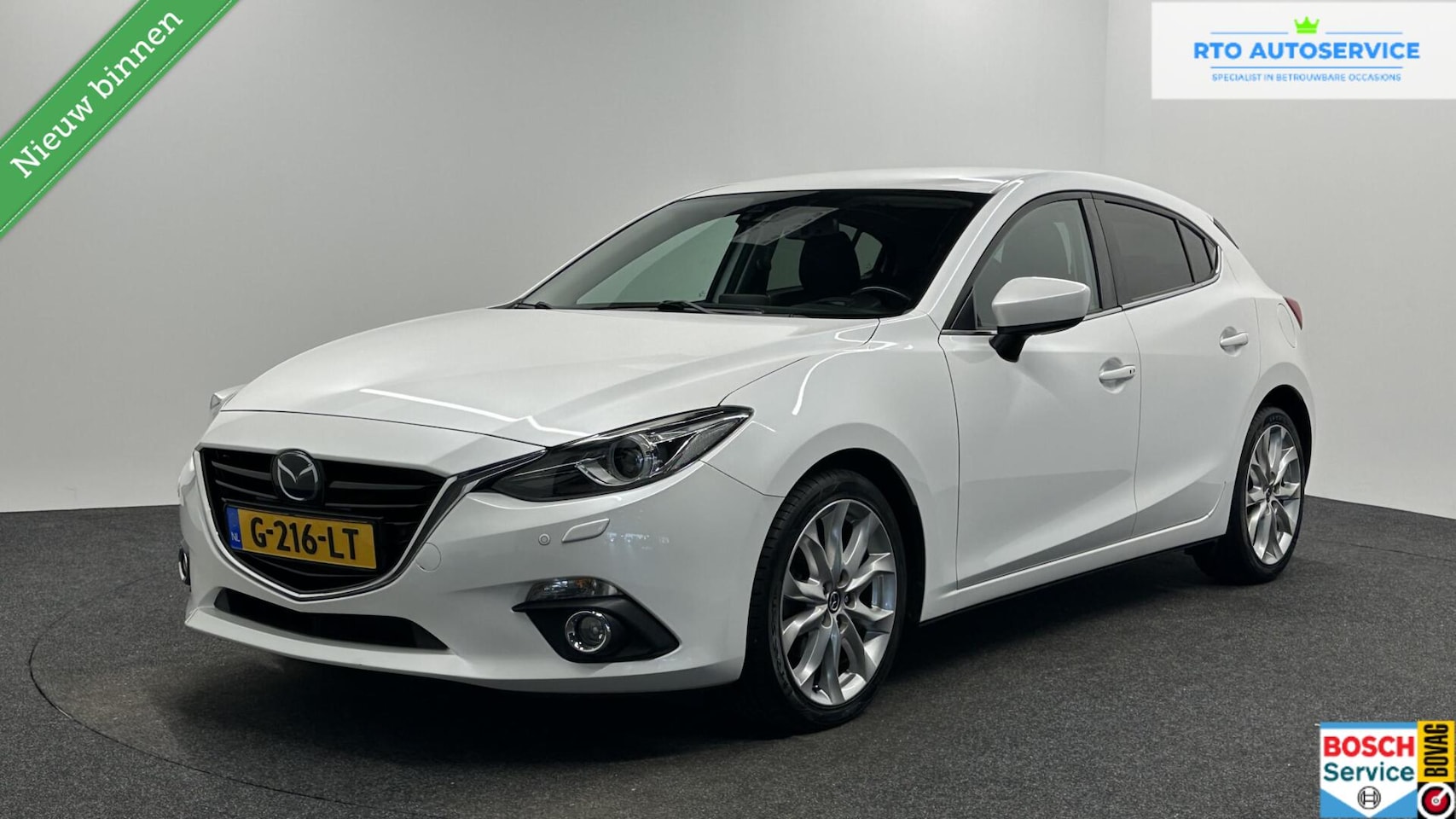 Mazda 3 - 2.0 TS+ HEAD UP NAVI ADAPTIEF CRUISE LM ECC CRUISE STOELVERWARMING. - AutoWereld.nl