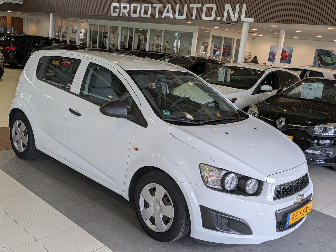 Chevrolet Aveo - 1.2 LS Airco, Cruise Control, Trekhaak, Stuurbekrachtiging - AutoWereld.nl