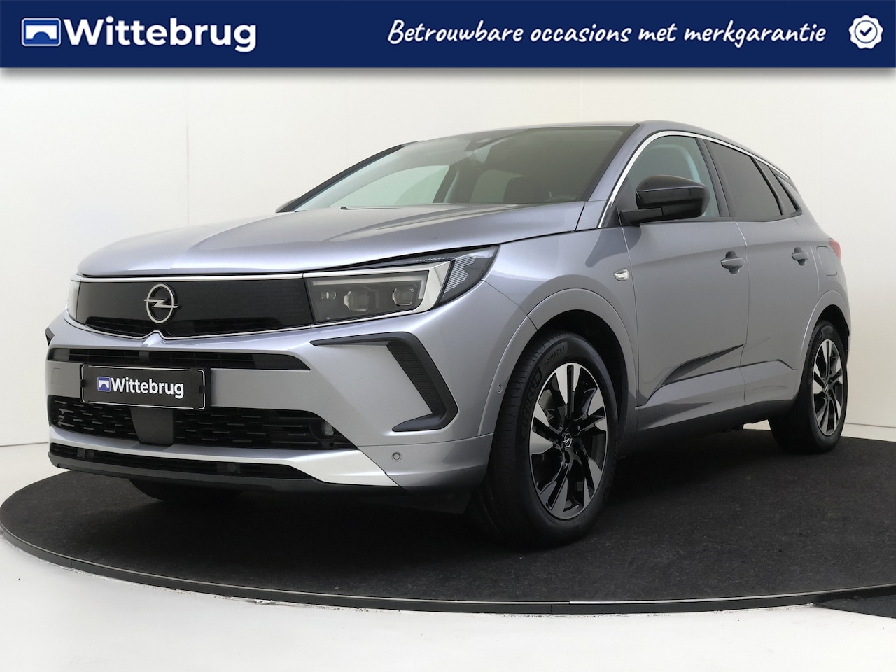 Opel Grandland - 1.6 Turbo 180PK Plug-In Hybrid Business Elegance Parkeerhulp V&A | Navigatie | Comfortstoe - AutoWereld.nl