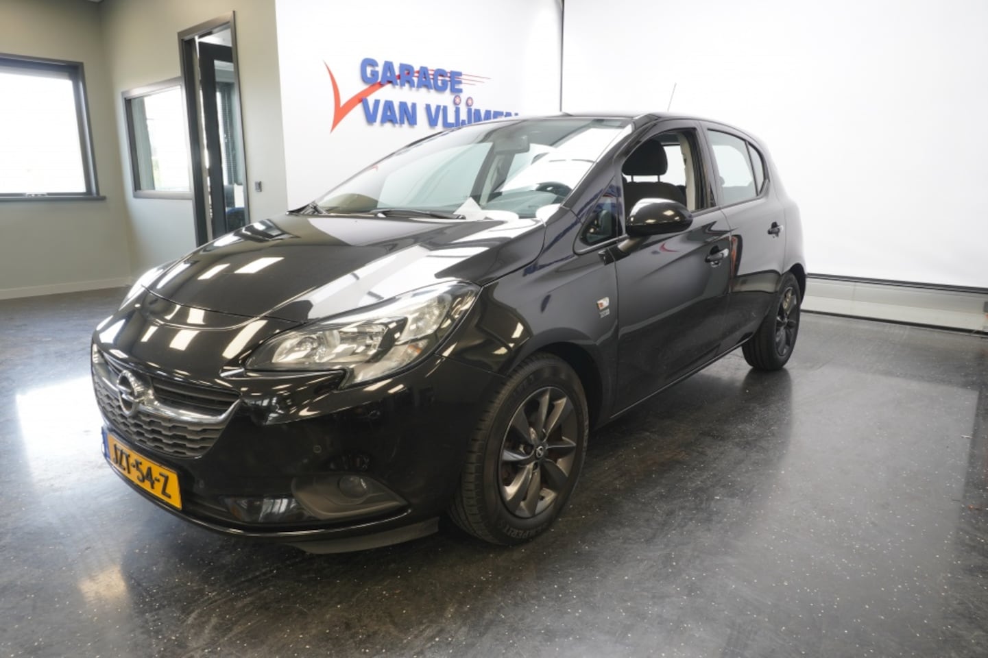 Opel Corsa - 1.4Turbo 120 Jaar Edition Airco Camera Cruise 16''LM - AutoWereld.nl