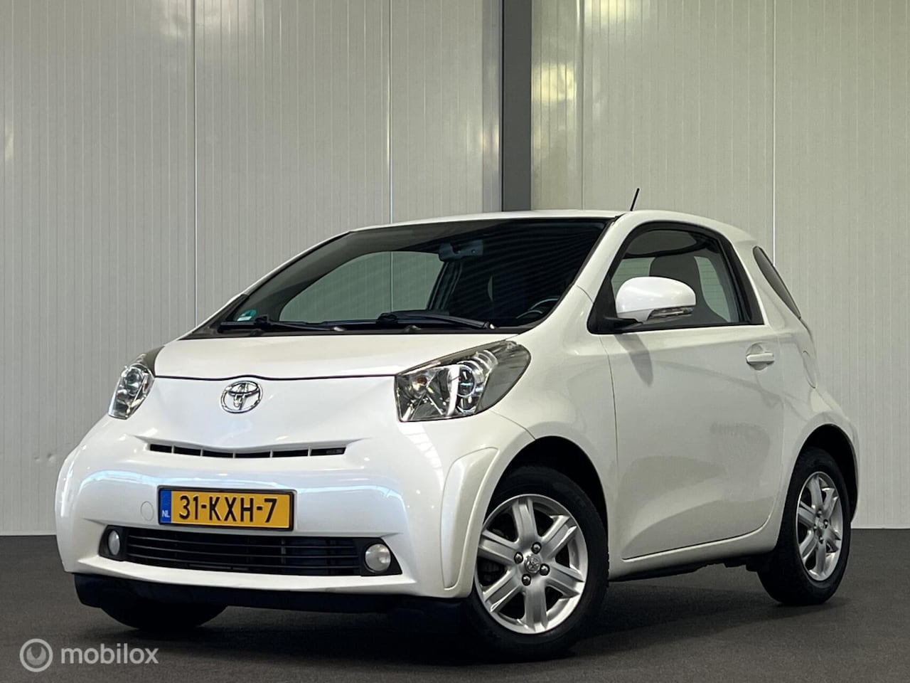 Toyota iQ - 1.0 VVTi Aspiration [ NAP climate LM parelmoer ] - AutoWereld.nl