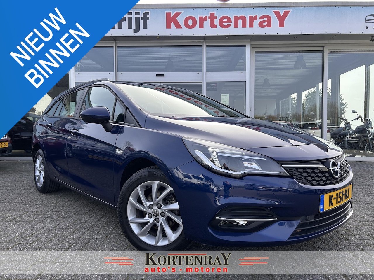 Opel Astra Sports Tourer - 1.2 Edition achteruitrij camera/airco/navi/cruise control/carplay/pdc - AutoWereld.nl