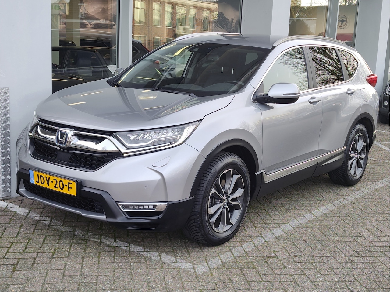 Honda CR-V - 2.0 E:HEV HYBRID ELEGANCE Leder | Dodehoeksensoren | 4x nw. All Seasonbanden - AutoWereld.nl