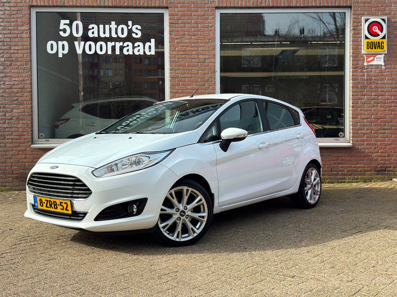 Ford Fiesta - 1.0 EcoBoost Titanium X | Navi | Cruise | Half leer | Airco | PDC | Velgen - AutoWereld.nl