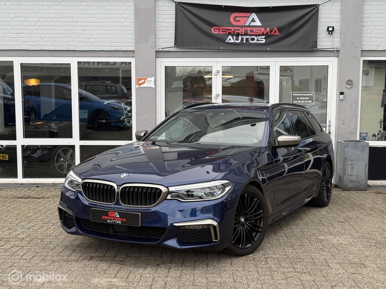 BMW 5-serie Touring - 540i xDrive High Executive Edition 540i xDrive High Executive Edition - AutoWereld.nl