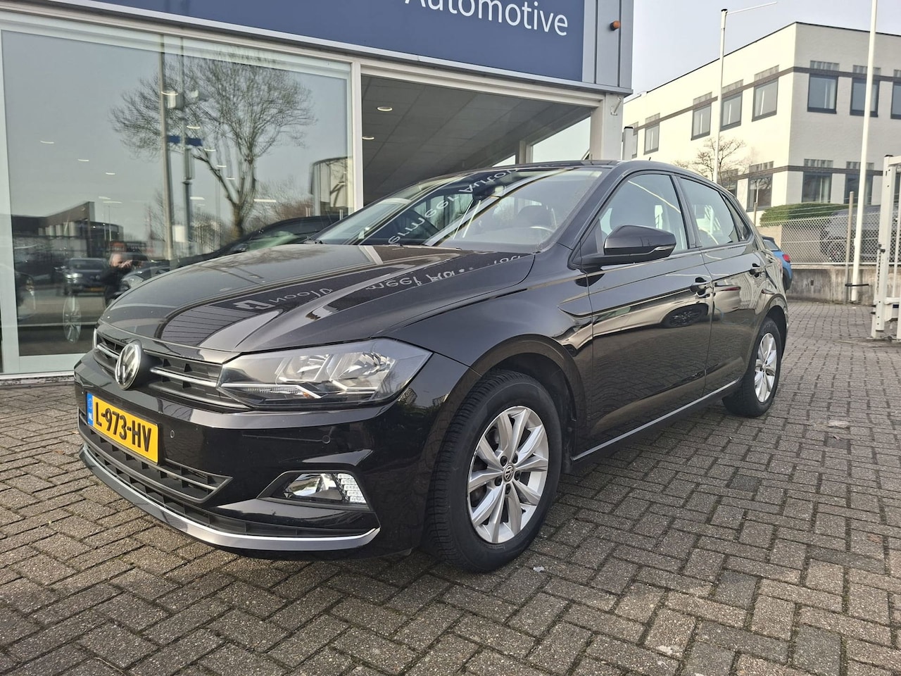 Volkswagen Polo - 1.0 TSI automaat / PDC / stoelverwarming / climate control - AutoWereld.nl