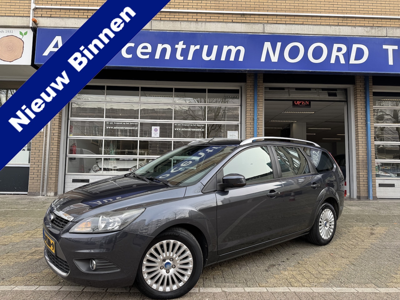 Ford Focus Wagon - 1.8 Limited Flexi Fuel NAP | Carplay |  Climate Control | Cruise Control | Parkeersensoren - AutoWereld.nl