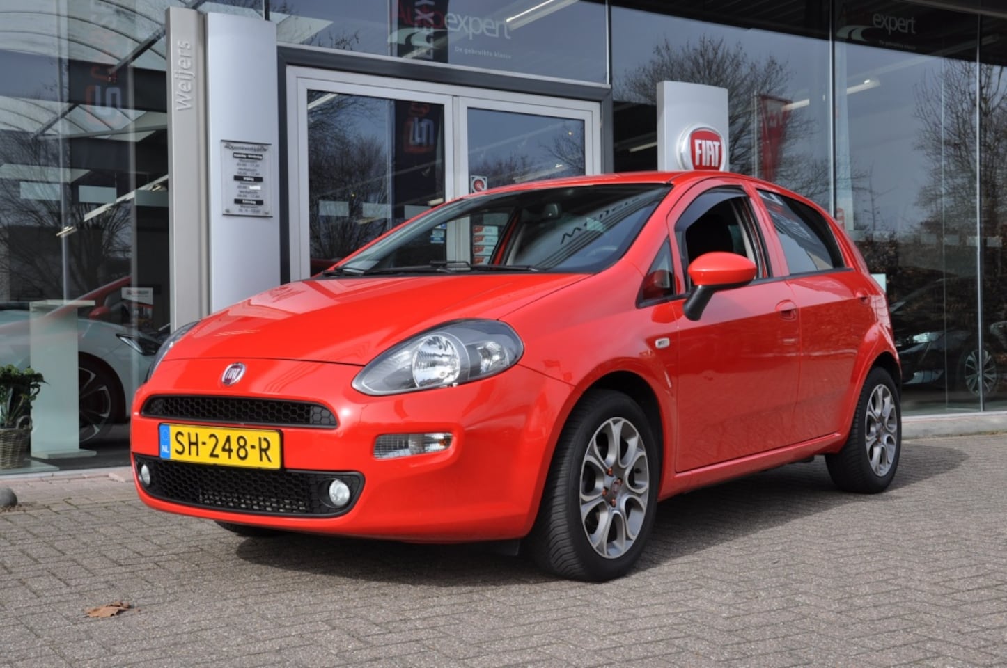 Fiat Punto Evo - 0.9 TA Sempre Navi Clima Trekhaak - AutoWereld.nl