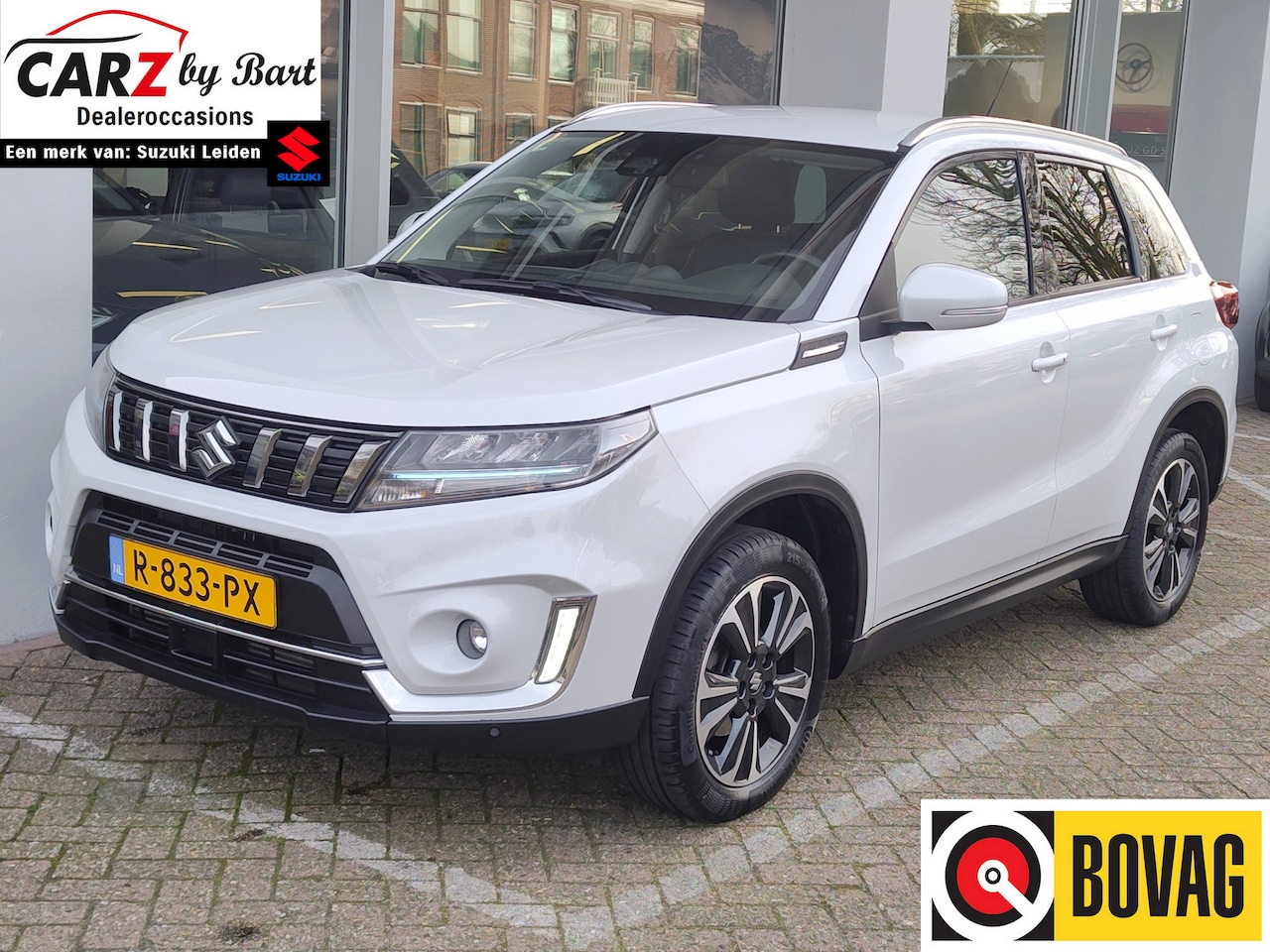 Suzuki Vitara - 1.4 BOOSTERJET STYLE SMART HYBRID AUT. Alcantara | Camera | Adaptive Cruise - AutoWereld.nl