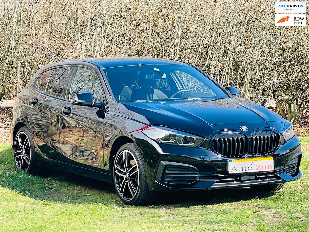 BMW 1-serie - 118i High Executive/Automaat/Carplay/Navi/Cruise C - AutoWereld.nl