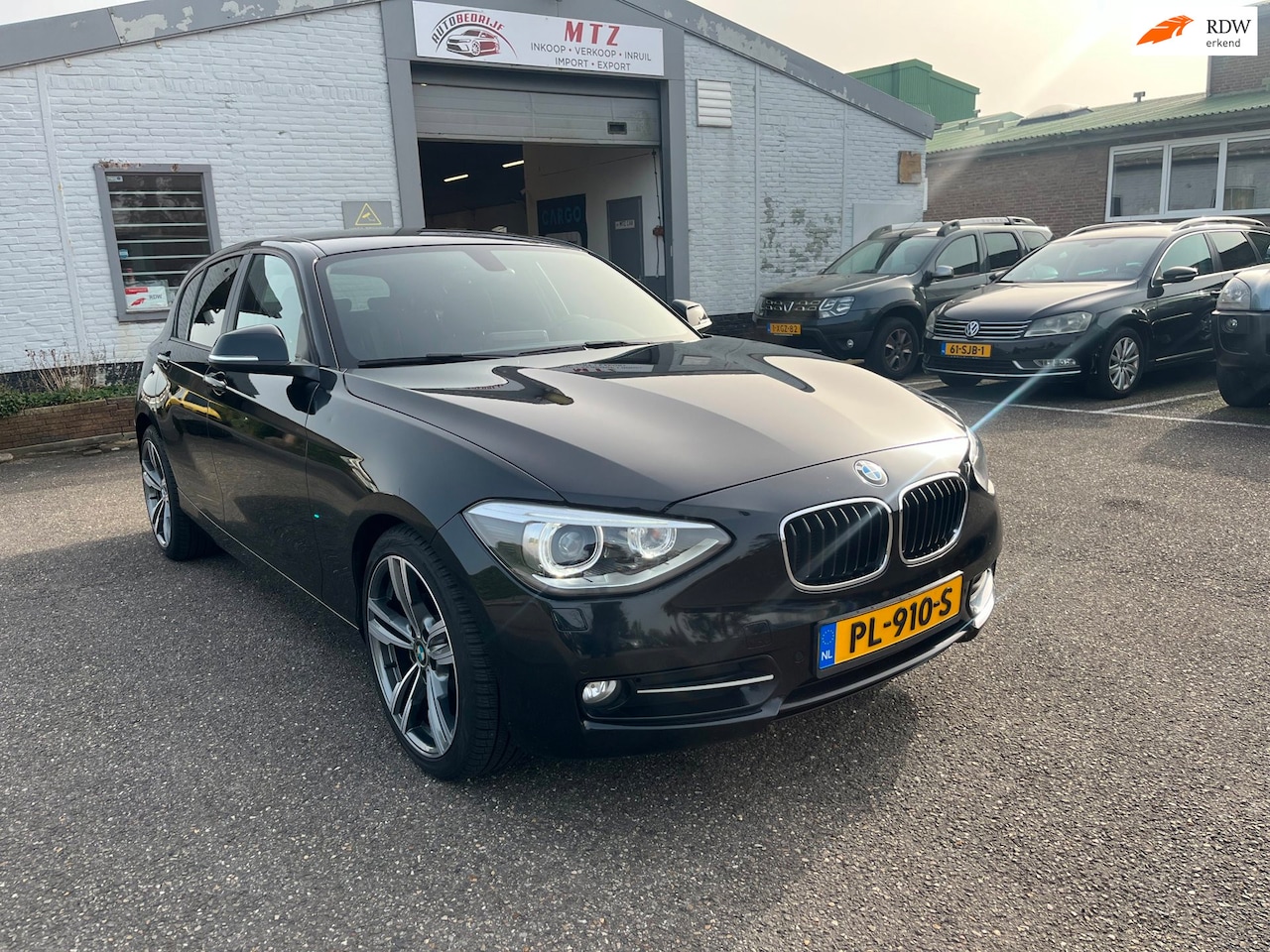 BMW 1-serie - 118d Business Voll. Dealer OH / ZGAN / CLIMA / BI-XENON - AutoWereld.nl