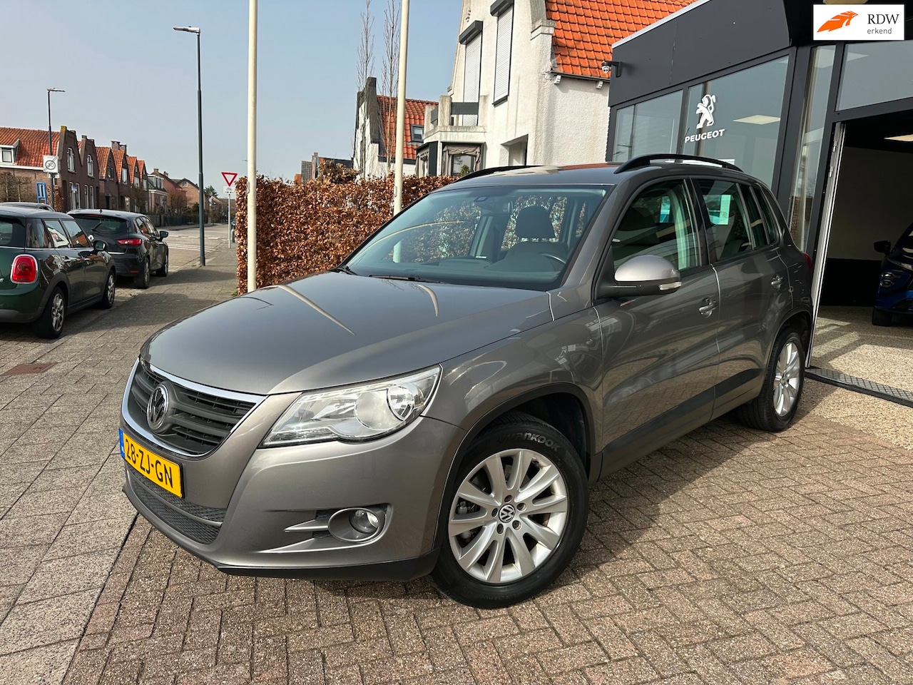 Volkswagen Tiguan - 1.4 TSI Comfort&Design 4Motion|1e Eigenaar|Navi|Airco|Parrot - AutoWereld.nl