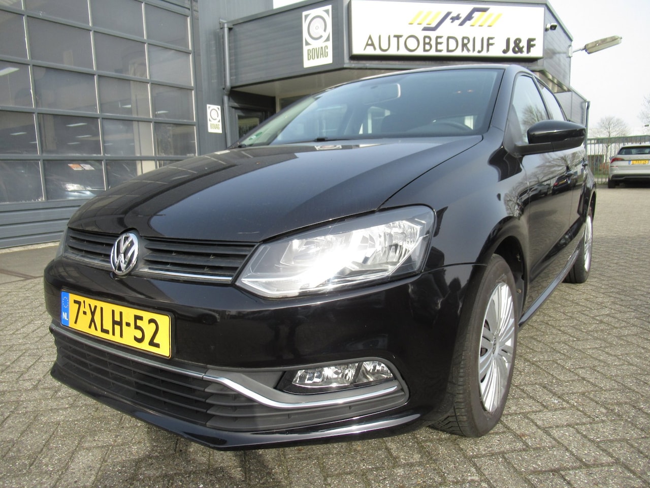 Volkswagen Polo - 1.2 TSI Comfortline / NAV / Bleutooth / PDC / Airco - AutoWereld.nl