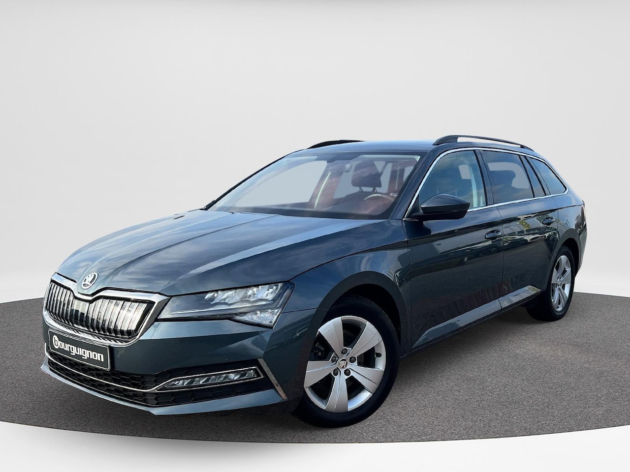 Skoda Superb Combi - 1.4 TSI iV Business Edition | PHEV | 218 pk | Stoelverwarming | PDC | Privacy glas | DCC | - AutoWereld.nl